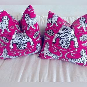 Pink down filled tiger pillows.